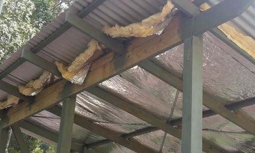 Insulating metal roofing fiberglass
